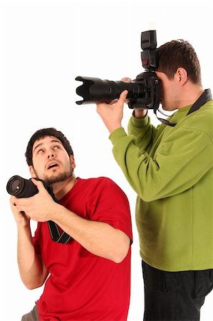 simsearch:400-04880707,k - Professional photographers in action on white background Stock Photo - Budget Royalty-Free & Subscription, Code: 400-05059265