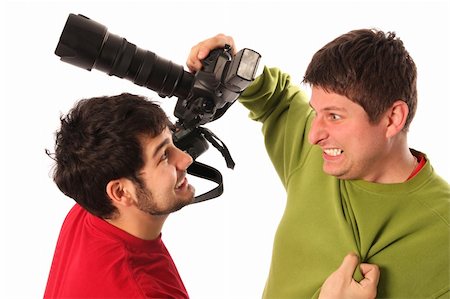 simsearch:400-04880707,k - Two Professional photographers fighting on white background Stock Photo - Budget Royalty-Free & Subscription, Code: 400-05059266