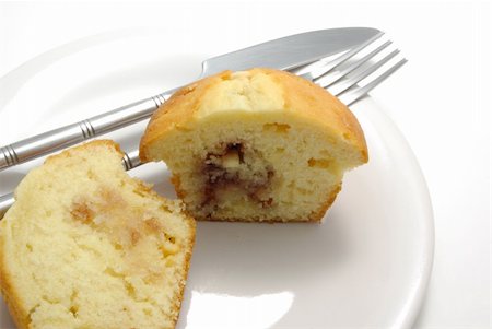White Chocolate jam filled muffin on a white plate. Stock Photo - Budget Royalty-Free & Subscription, Code: 400-05059315
