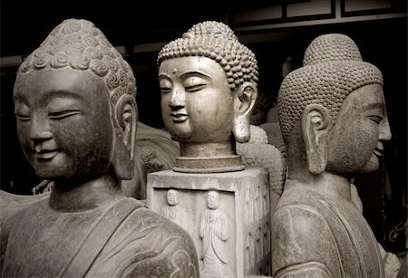 A trio of Buddha statuettes for sale. Stock Photo - Budget Royalty-Free & Subscription, Code: 400-05059678