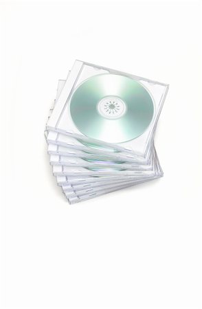 cd jewel case neat stack on white background Stock Photo - Budget Royalty-Free & Subscription, Code: 400-05050327
