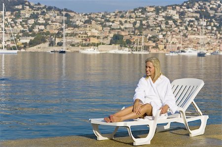 france beach sunbathing - A beautiful young woman sunbathing in a Mediterranean resort Stock Photo - Budget Royalty-Free & Subscription, Code: 400-05050934