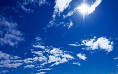 simsearch:400-05234387,k - sun and beautiful clouds on blue sky Fotografie stock - Microstock e Abbonamento, Codice: 400-05051045