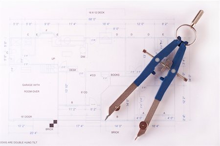 Compass and blueprint on a table Stock Photo - Budget Royalty-Free & Subscription, Code: 400-05051145