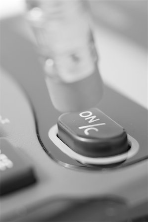 erase pencil numbers - macro of a pencil pressing the on key of a calculator Stock Photo - Budget Royalty-Free & Subscription, Code: 400-05051318