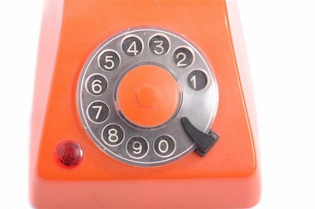 simsearch:400-03989083,k - old orange phone on the white background Photographie de stock - Aubaine LD & Abonnement, Code: 400-05051370