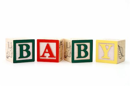 simsearch:400-04660584,k - word baby formed by alphabet wood blocks on a white surface Foto de stock - Royalty-Free Super Valor e Assinatura, Número: 400-05051588