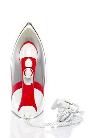 simsearch:400-04019890,k - Red electric iron reflected on white background Stock Photo - Budget Royalty-Free & Subscription, Code: 400-05051727