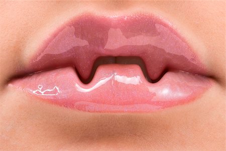 simsearch:400-05676902,k - clse up of a red mouth with lipstick and lip gloss Stock Photo - Budget Royalty-Free & Subscription, Code: 400-05052241