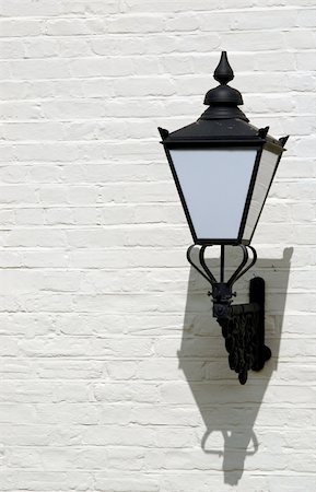 steet - decorative lamp on painted brick wall Stock Photo - Budget Royalty-Free & Subscription, Code: 400-05052334