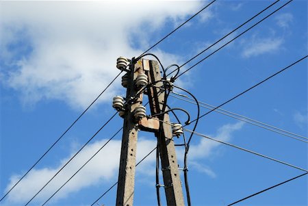 simsearch:400-05054067,k - Transmission line tower on the blue skies background Foto de stock - Super Valor sin royalties y Suscripción, Código: 400-05052352