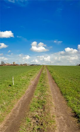 A footpath across a green field Photographie de stock - Aubaine LD & Abonnement, Code: 400-05052481