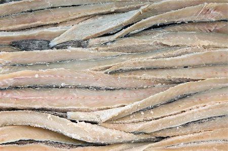 Pile of dried and salted codfish fillets Fotografie stock - Microstock e Abbonamento, Codice: 400-05052732