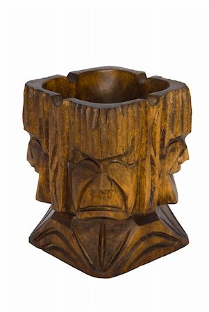 Traditional Ifugao Ashtray. This is a wooden souvenir bought in the Philippines (North Luzon). These wooden pieces are based on old traditional designs and made by the local Ifugao people. Photographie de stock - Aubaine LD & Abonnement, Code: 400-05052974