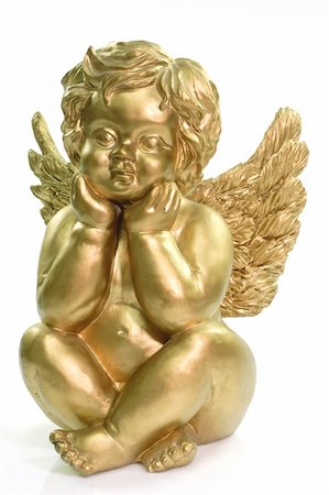 Figurine of a dreaming cherub on bright background Stock Photo - Budget Royalty-Free & Subscription, Code: 400-05053686
