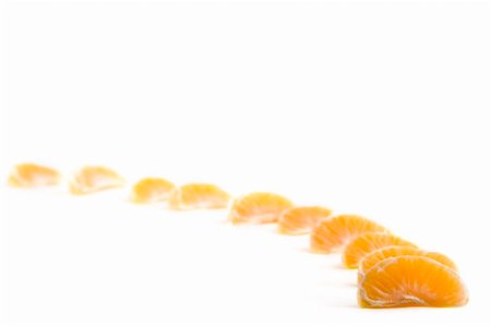 A row of christmas orange slices with white space at the top for text Stock Photo - Budget Royalty-Free & Subscription, Code: 400-05053864