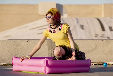 simsearch:400-05054627,k - Portrait of a Punk Girl with Bright Colorful and Big Sunglasses Outdoors at Sundown Stock Photo - Budget Royalty-Free & Subscription, Code: 400-05053878