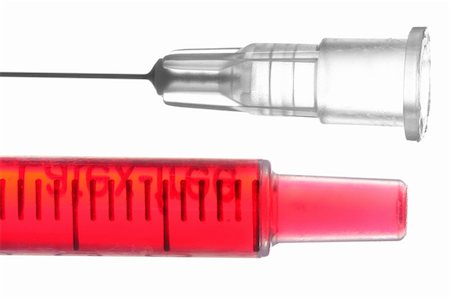 simsearch:400-05205121,k - Syringe filled with blood and injection Fotografie stock - Microstock e Abbonamento, Codice: 400-05064138