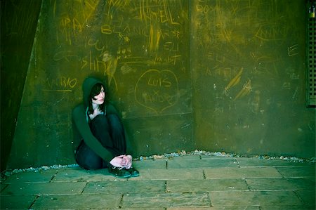depressed woman in the street - Young woman alone in urban background. Stock Photo - Budget Royalty-Free & Subscription, Code: 400-05064591