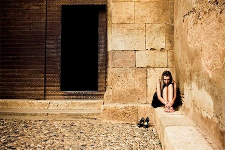 depressed woman in the street - Young sad woman in elegant black dress. Stock Photo - Budget Royalty-Free & Subscription, Code: 400-05064605