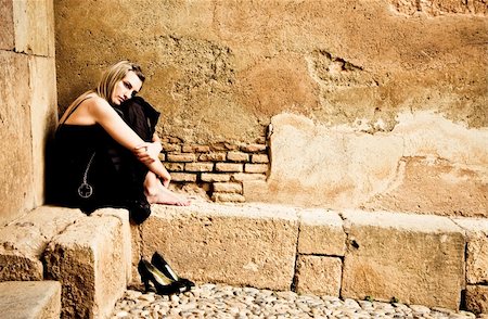 depressed woman in the street - Young sad woman in elegant black dress. Stock Photo - Budget Royalty-Free & Subscription, Code: 400-05064606