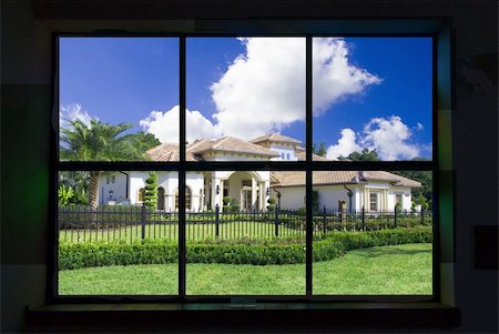 simsearch:693-06667916,k - Looking through a window at an upscale home Stock Photo - Budget Royalty-Free & Subscription, Code: 400-05065354