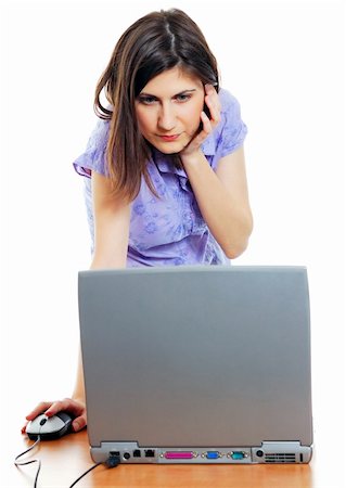 attractive young woman working with the computer Stock Photo - Budget Royalty-Free & Subscription, Code: 400-05065972