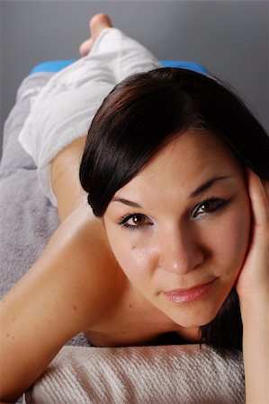 simsearch:400-04517890,k - attractive brunette woman relaxing in massage Stock Photo - Budget Royalty-Free & Subscription, Code: 400-05066395