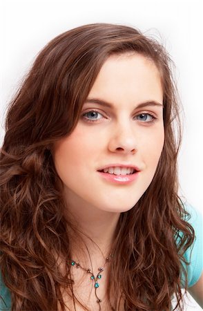 Head portrait of a pretty brown-hair girl; isolated on white Photographie de stock - Aubaine LD & Abonnement, Code: 400-05066545