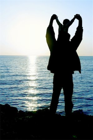 silhouette father and son sunset - father and son at sunset sea Stock Photo - Budget Royalty-Free & Subscription, Code: 400-05066939