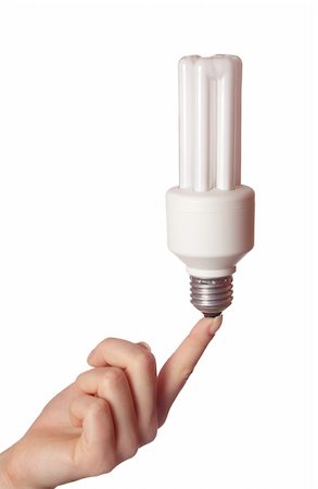 simsearch:400-04263435,k - Fluorescent light bulb on female hand.Isolated on white. Photographie de stock - Aubaine LD & Abonnement, Code: 400-05067154