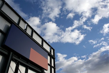 simsearch:400-04261722,k - Blue and red blank billboard with cloudy sky Photographie de stock - Aubaine LD & Abonnement, Code: 400-05068283