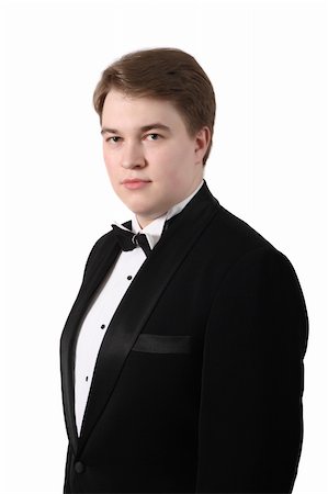 Young man in tuxedo, isolated on white background Stock Photo - Budget Royalty-Free & Subscription, Code: 400-05068474