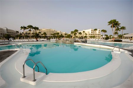 Nice pool at a hotel resort Stock Photo - Budget Royalty-Free & Subscription, Code: 400-05068758