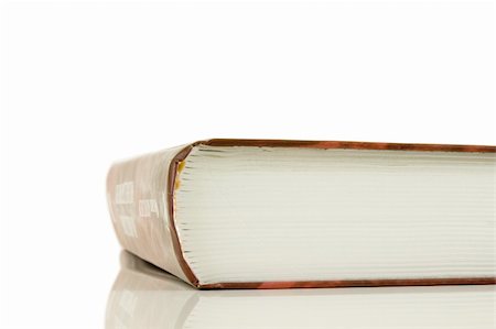 simsearch:400-04950813,k - Isolated large closed book on a white background, selective focus Fotografie stock - Microstock e Abbonamento, Codice: 400-05060262