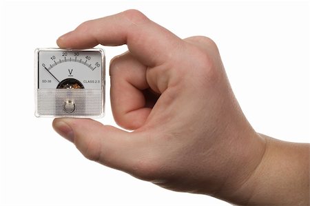 Man's hand holds a voltmeter. Isolated on white [with clipping path]. Stock Photo - Budget Royalty-Free & Subscription, Code: 400-05060384