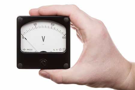 Man's hand holds a voltmeter. Isolated on white [with clipping path]. Stock Photo - Budget Royalty-Free & Subscription, Code: 400-05060389