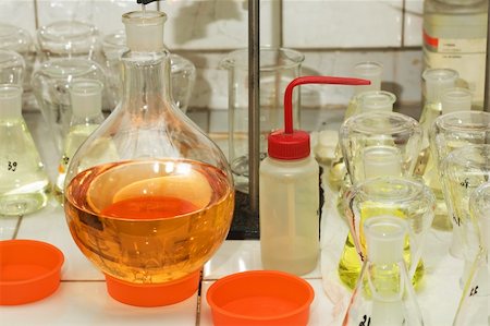 Many different flasks with liquid in chemistry lab Stock Photo - Budget Royalty-Free & Subscription, Code: 400-05060400