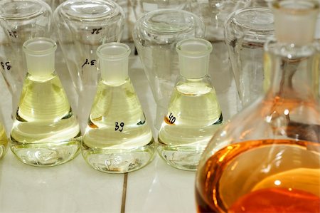 Many different flasks with liquid in chemistry lab Stock Photo - Budget Royalty-Free & Subscription, Code: 400-05060401