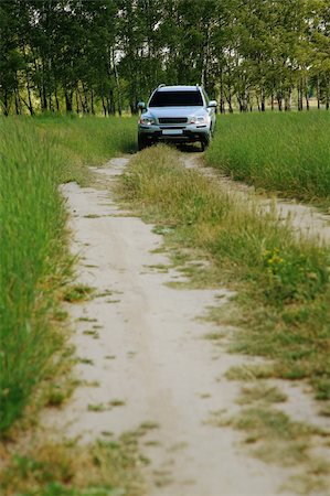 simsearch:400-06081401,k - The modern car on earth road a sunny day Stock Photo - Budget Royalty-Free & Subscription, Code: 400-05060425