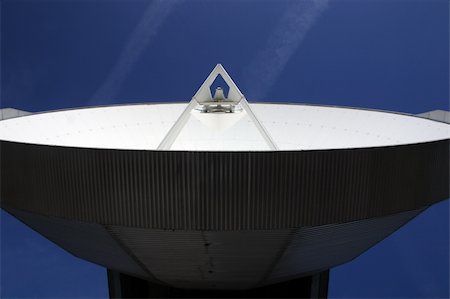 View of a huge satellite dish against the blue sky Stock Photo - Budget Royalty-Free & Subscription, Code: 400-05060854