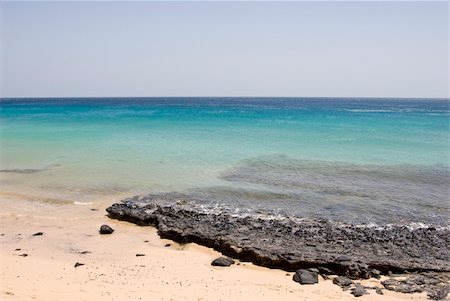 Morro Jable Beach (Fuerteventura, Spain) Photographie de stock - Aubaine LD & Abonnement, Code: 400-05061328