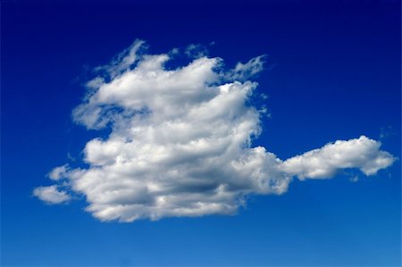 respiro profundo - White cloud in a deep blue sky Photographie de stock - Aubaine LD & Abonnement, Code: 400-05061512
