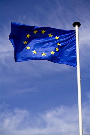 simsearch:400-05136582,k - Waving flag of European union with blue sky background Stockbilder - Microstock & Abonnement, Bildnummer: 400-05061901