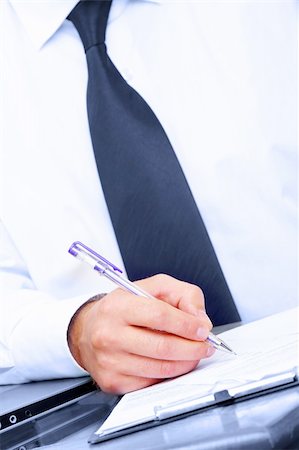 Fragment like picture of businessman signing some papers Photographie de stock - Aubaine LD & Abonnement, Code: 400-05062141