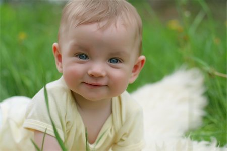 simsearch:400-04093413,k - Cute small boy in green grass - he smiles and has fun Stock Photo - Budget Royalty-Free & Subscription, Code: 400-05062184