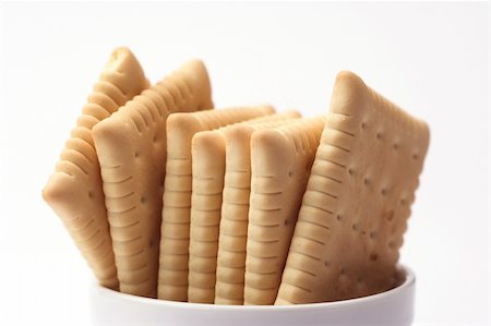 snack cracker white background - Stack of cookies close up Stock Photo - Budget Royalty-Free & Subscription, Code: 400-05062266