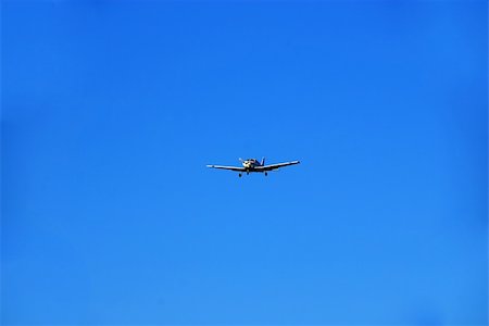 pazham (artist) - A trainer glider plane isolated against a clear blue sky Photographie de stock - Aubaine LD & Abonnement, Code: 400-05062323