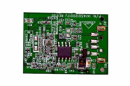 An printed circuit board isolated on a white back ground Foto de stock - Super Valor sin royalties y Suscripción, Código: 400-05062367