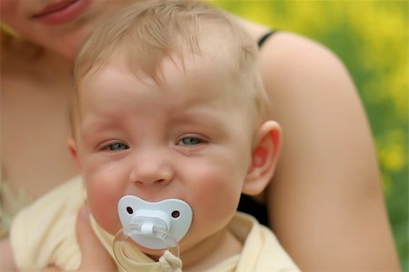 simsearch:400-04093413,k - Young cute boy with soother in his mouth Stock Photo - Budget Royalty-Free & Subscription, Code: 400-05062406